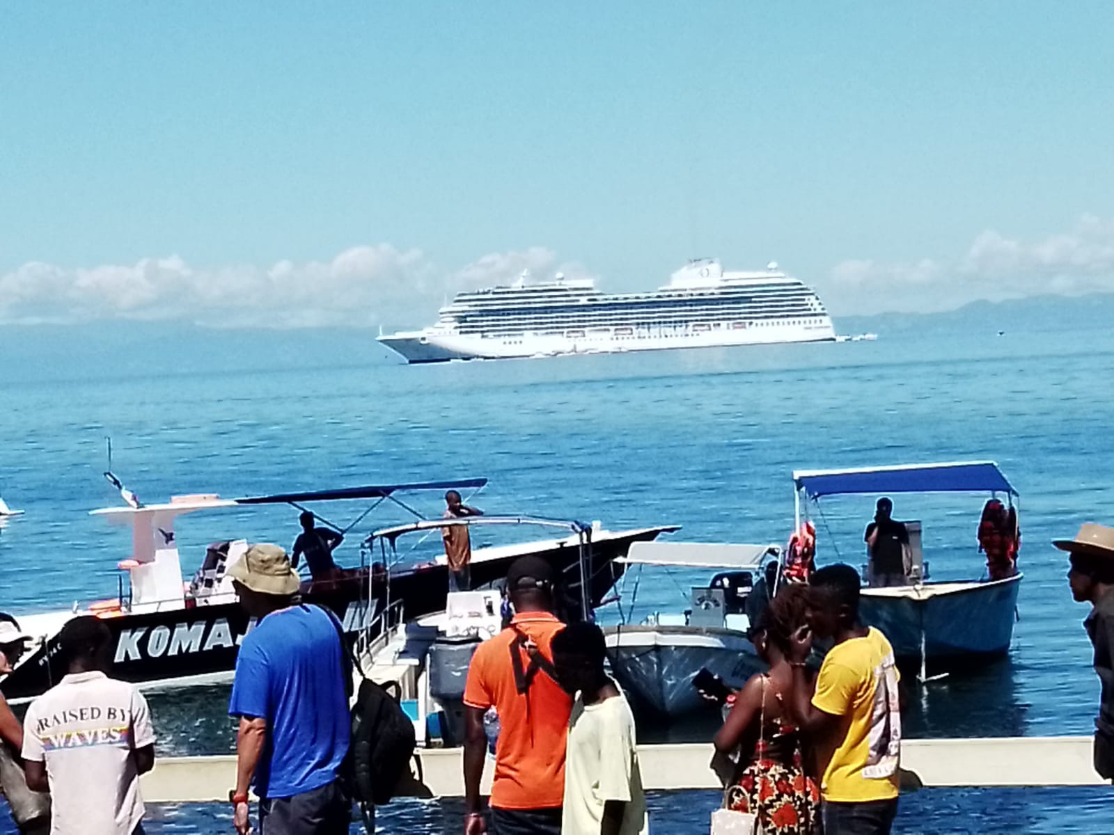 Cruise ship offshore and transfer boats at the port