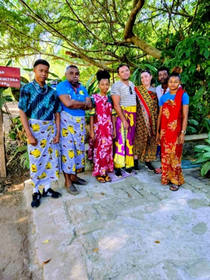 Visitors in traditional clothing